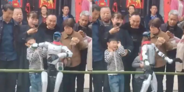 中国机器人表演到一半 突甩男童一巴掌继续跳