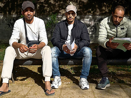 希望与混乱并存 西班牙移民“转正”面临手续难题